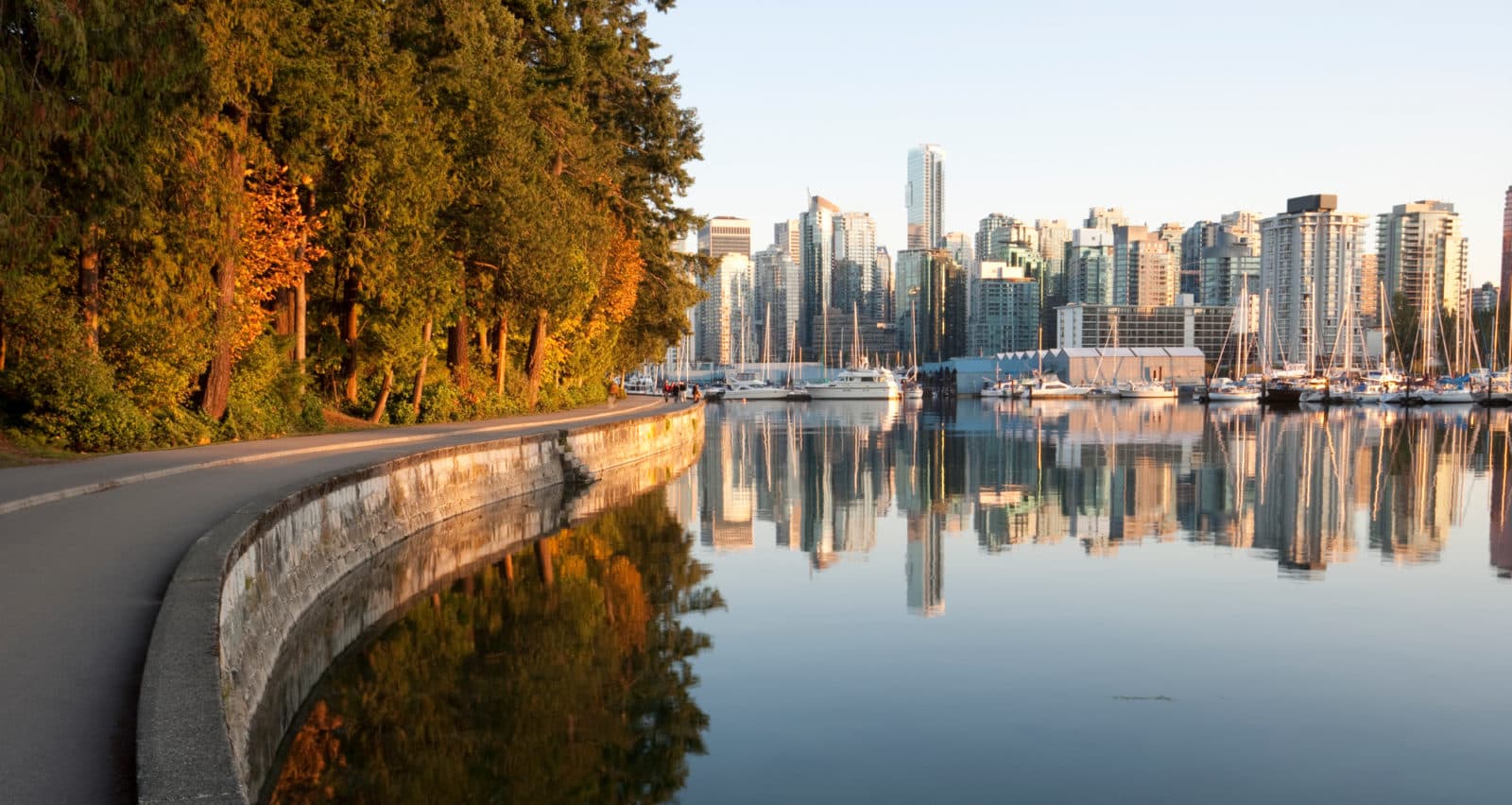 Vancouver skyline at dusk with mountains in the background